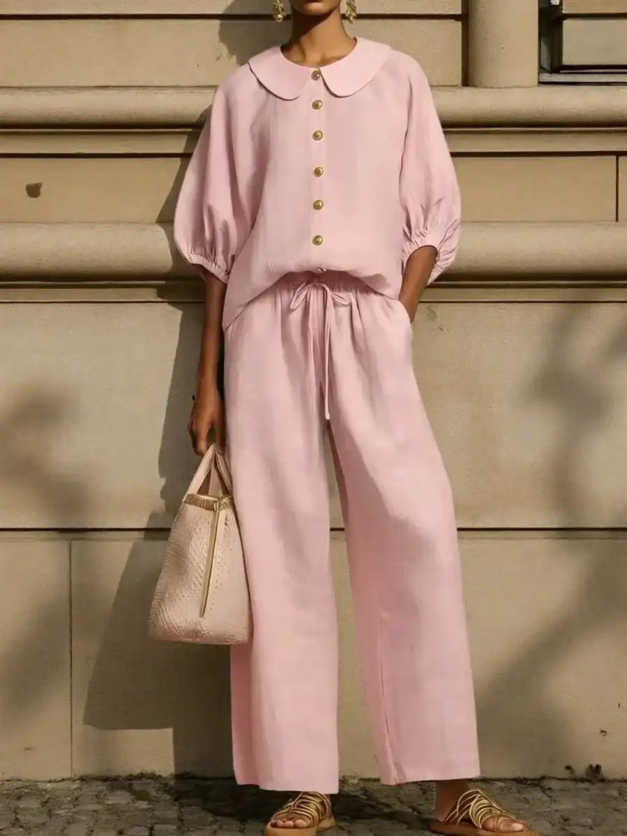Pink linen blouse with Peter Pan collar and matching wide-leg pants for sophisticated mature women