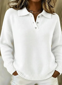 White ribbed knit polo sweater with relaxed fit, button placket, and soft texture for sophisticated women's wear
