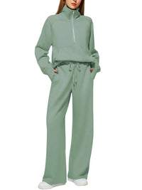 Mint green women's lounge set with half-zip top and drawstring pants, relaxed fit for comfort
