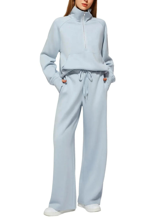 Light blue relaxed fit lounge set with half-zip top and wide-leg pants for comfortable everyday wear