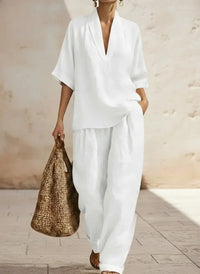 White linen V-neck top and wide-leg pants set for women, relaxed fit, breathable fabric, stylish plus size outfit