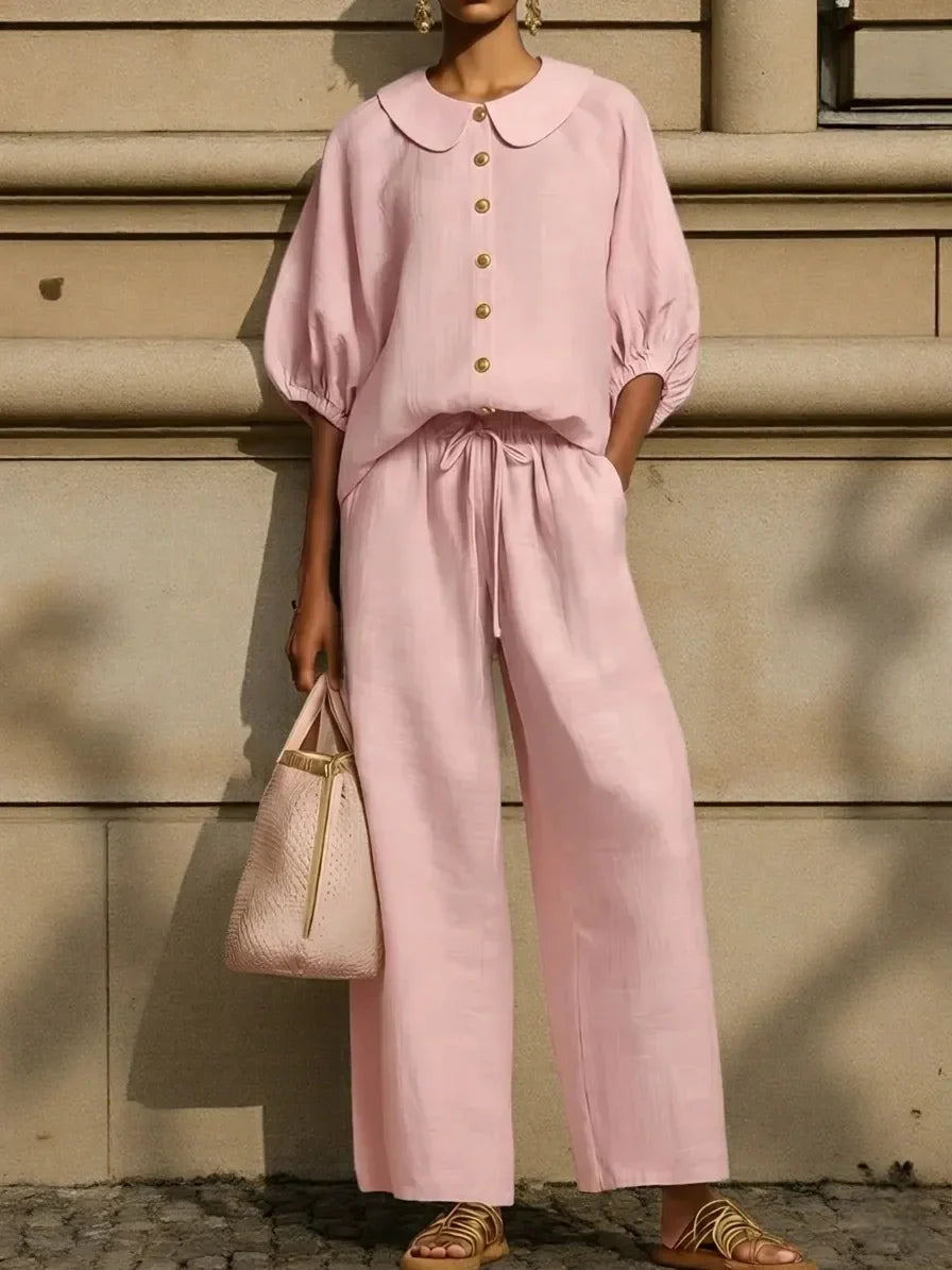 Pink linen blouse with Peter Pan collar and matching wide-leg pants for sophisticated mature women