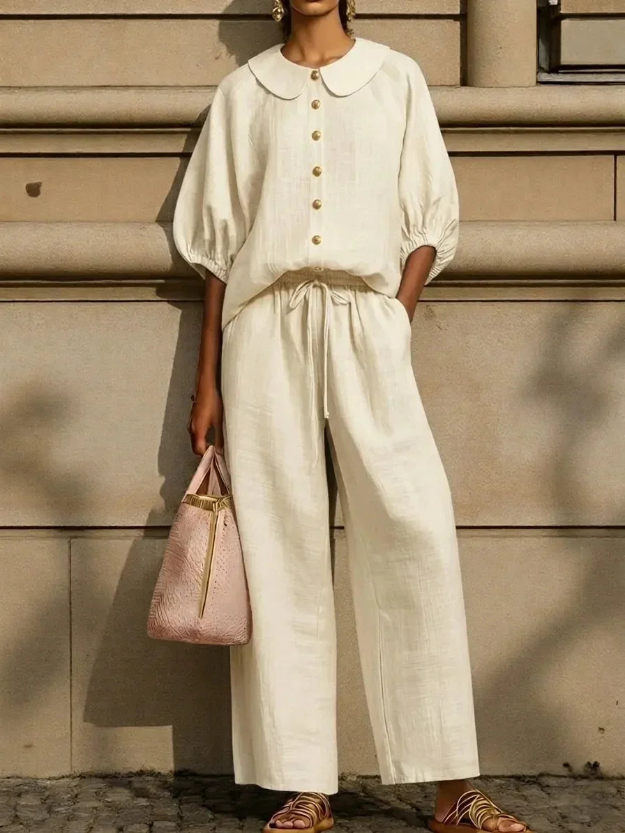 Cream linen blouse with Peter Pan collar and wide-leg pants, stylish plus size outfit for mature women