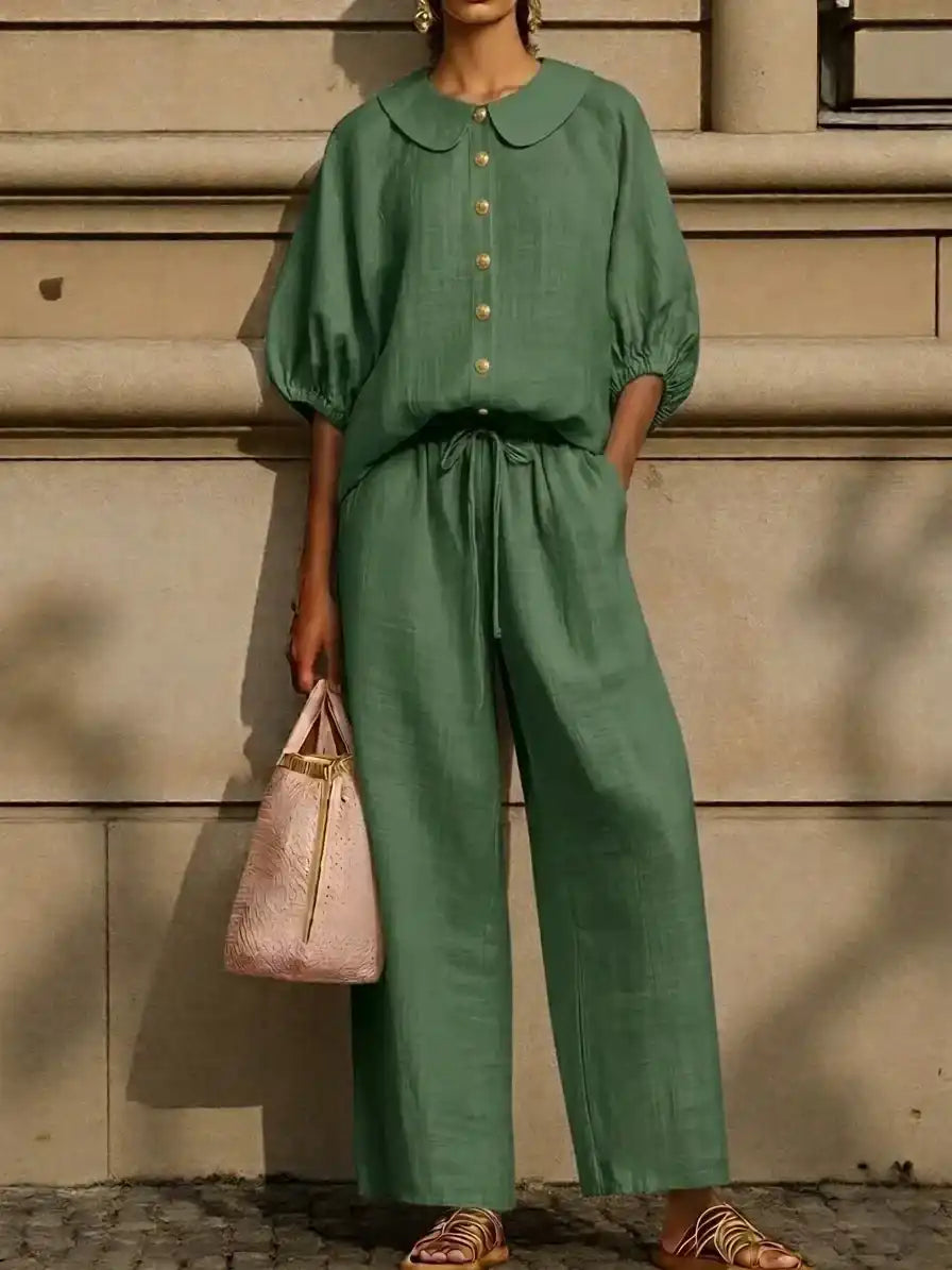 Green linen blouse with Peter Pan collar and wide-leg pants, stylish plus size outfit for mature women