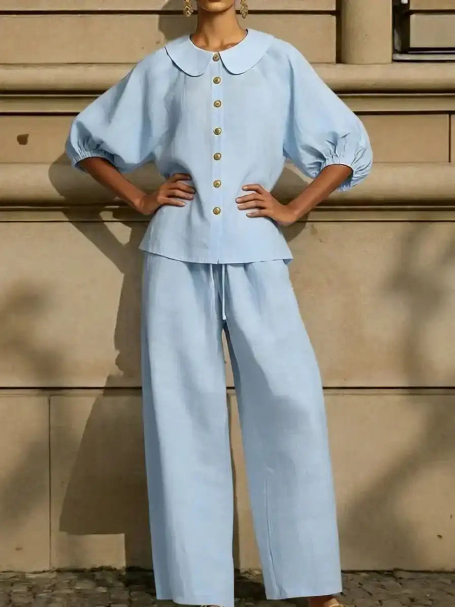 Light blue linen blouse with Peter Pan collar and wide-leg pants, stylish plus size outfit for mature women
