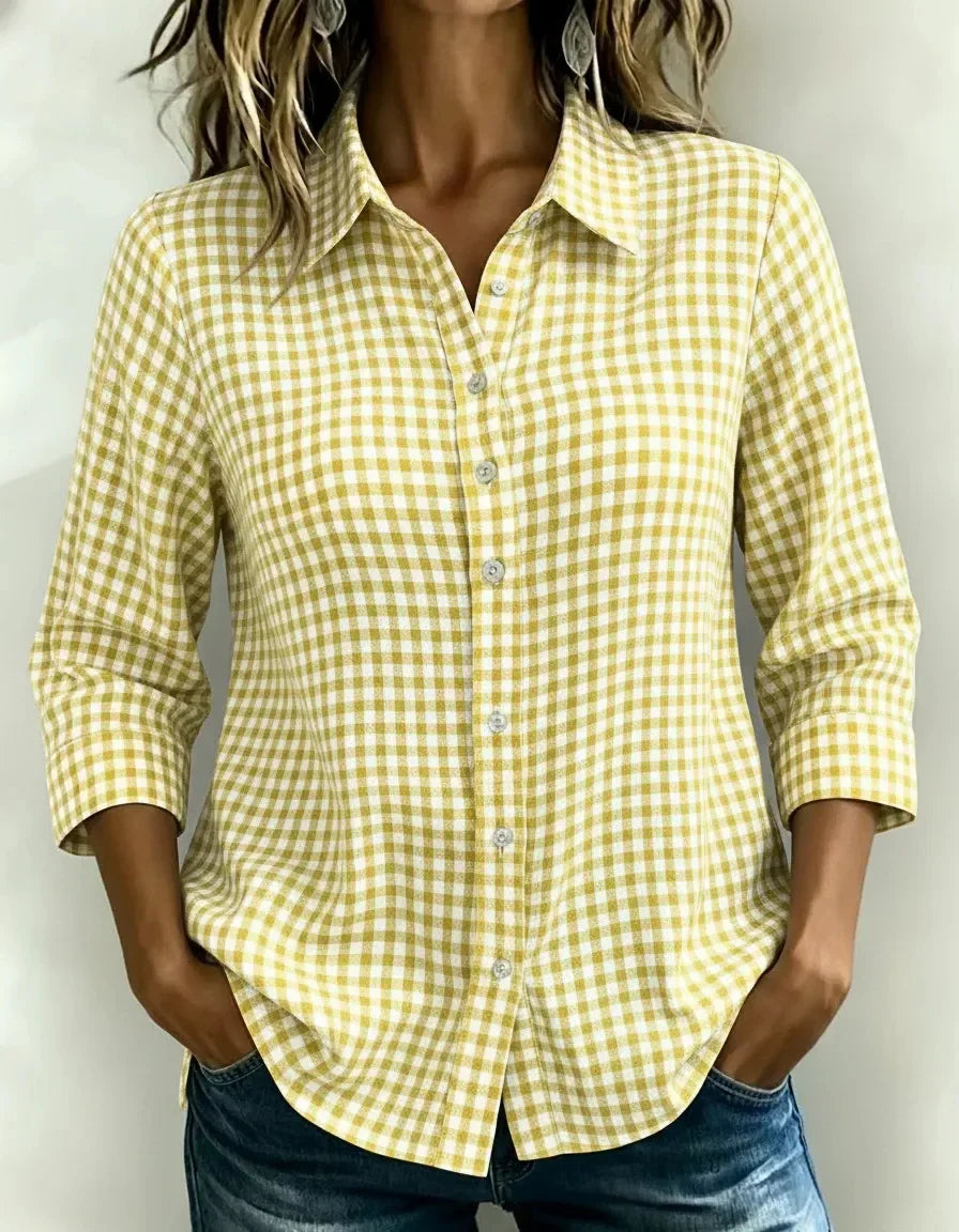 Yellow and white gingham button-down shirt for women, relaxed fit, rolled sleeves, paired with jeans