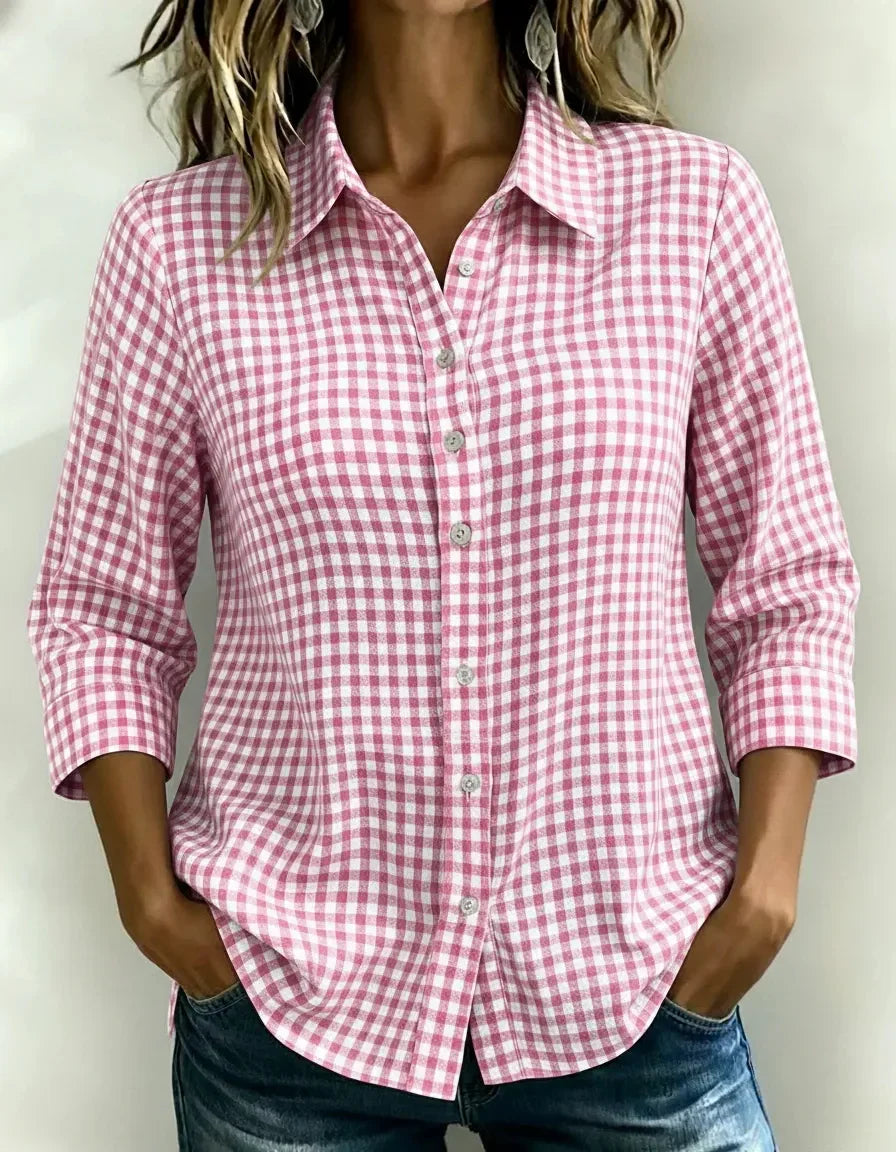Pink and white gingham button-down shirt for women, relaxed fit, rolled sleeves, paired with jeans