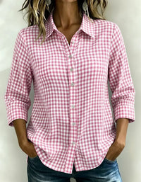 Pink and white gingham button-down shirt for women, relaxed fit, rolled sleeves, paired with jeans