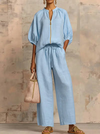 Light blue linen blouse and wide-leg pants set for women, relaxed fit, breathable fabric, stylish plus size outfit